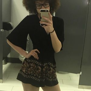 Black Floral Romper by Charlotte Ruse